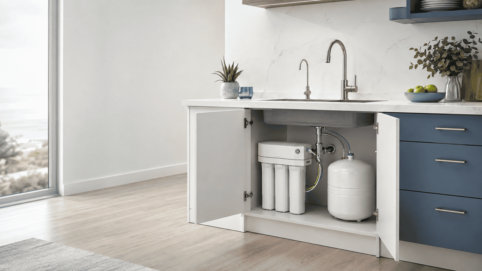 Modern kitchen with an open under-sink cabinet showing a reverse osmosis water filtration system and storage tank beneath a brushed-nickel drinking water faucet.